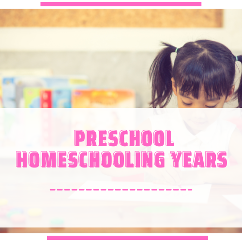A preschool girl working at her desk. Preschool homeschooling.
