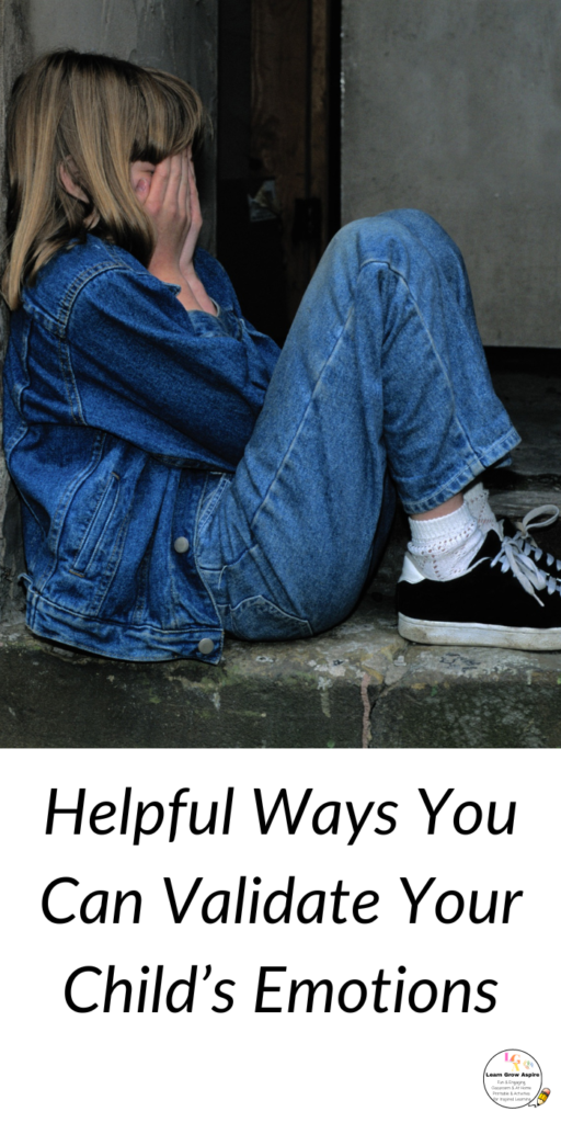 a girl sitting unhappy covering her face on a ledge. Effective Ways to Validate Your Child’s Emotions.